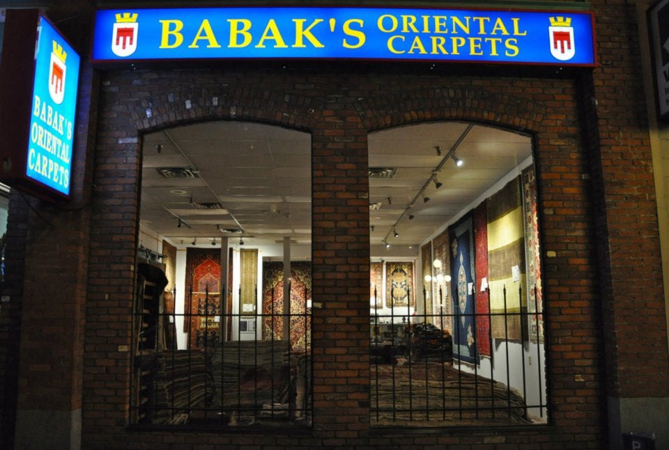 Inside Babak's Oriental Carpets showroom on Fort Street, Victoria
