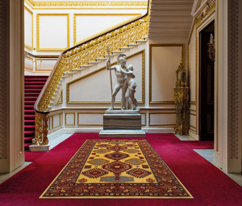 Carpet below a grand staircase